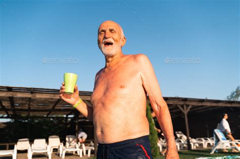 Years Old White Man With Beard Relaxing Near The Pool On A Hot