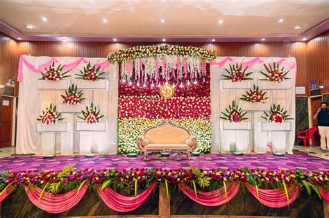 Premium Photo | A wedding stage with a floral backdrop