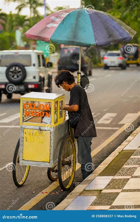 A Man Selling Traditional Food on Street Editorial Photography - Image of 2022, culture: 258808237