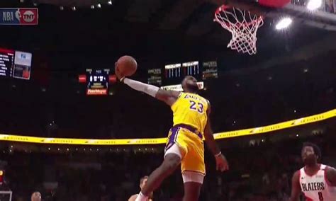 Watch: LeBron James has two huge dunks for first career Lakers points