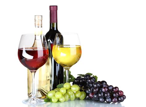 Ripe grapes, wine glasses and bottles of wine isolated on white