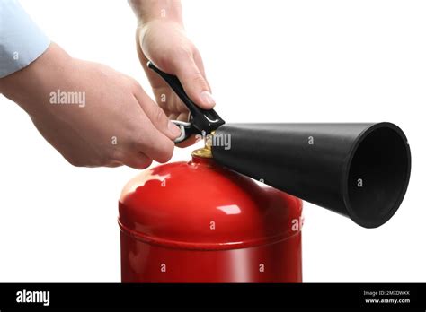 Man Using Fire Extinguisher On White Background Closeup Stock Photo