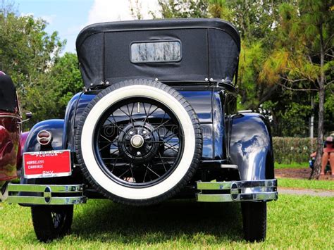 Rear View Of 1928 Ford Horseless Carriage Stock Image Image Of Light