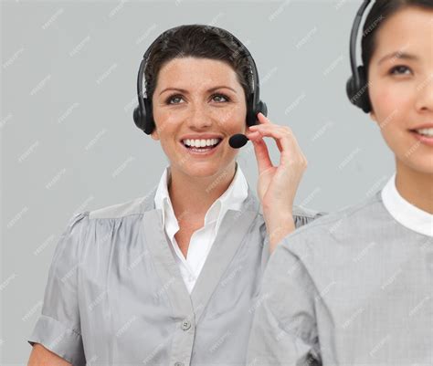 Premium Photo | Two customer service agents with headset on