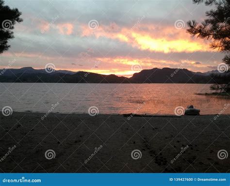 Sunset on the lake stock photo. Image of enjoying, argentina - 139427600