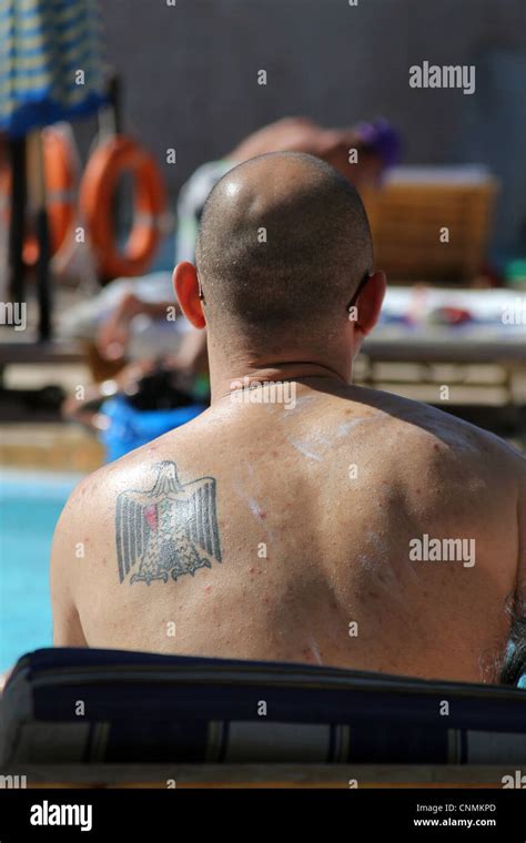 Man with Albania flag tattoo on shoulder Stock Photo - Alamy