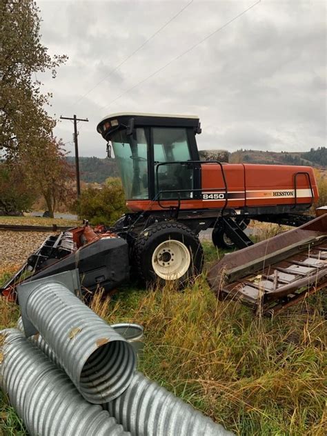 1998 Hesston 8450 Self Propelled Windrowers And Swather 18500