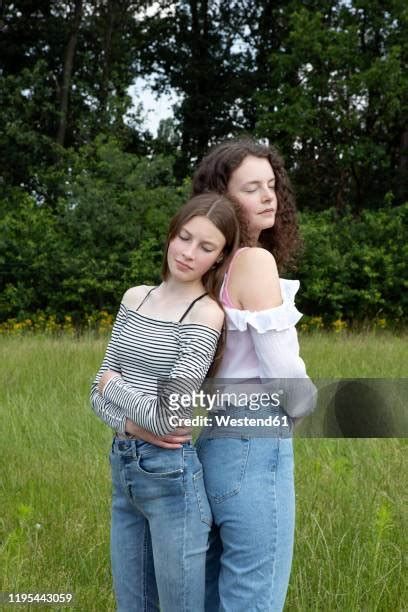 Two People Standing Shoulder To Shoulder Photos And Premium High Res Pictures Getty Images