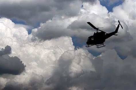 Premium Photo | Military helicopter in the sky