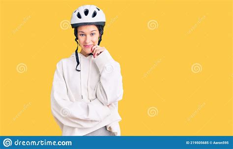 Beautiful Brunette Young Woman Wearing Bike Helmet And Sporty Clothes