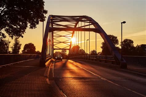 Scenic Sunset Behind The Bridge Over The River Weser In Hoya Germany