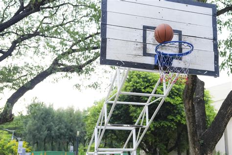 Men take a walk to relax after playing basketball in a public area