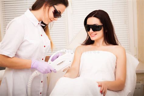 Skin Care Adult Woman Having Laser Hair Removal In Professional Beauty Salon Stock Image