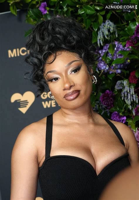 Megan Thee Stallion Sexy Flaunts Her Hot Cleavage And Legs In A Stunning Black Dress At Golden