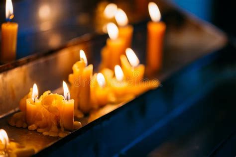 Row Candles In Church Candle Light Flame In Worship Stock Image