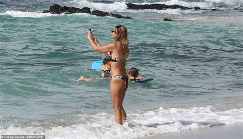 Kevin Costner S Bikini Clad Ex Christine Baumgartner Looks Jovial As She Hits The Beach In