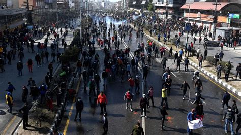 Nepal police fire tear gas, water cannons to disperse protest over US 'gift' | CNN