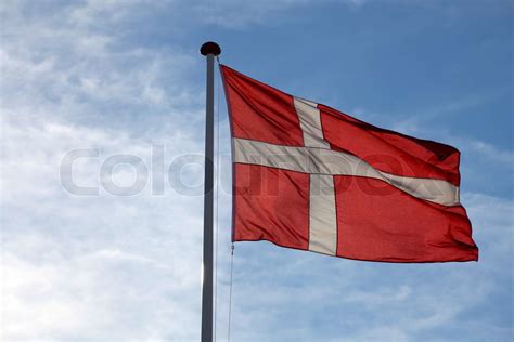 Den Danske Flag Dannebrog Vinke Mod Bl Himmel Stock Foto Colourbox