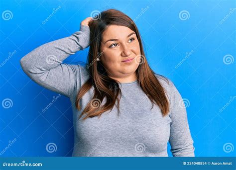 Beautiful Brunette Plus Size Woman Wearing Casual Clothes Confuse And Wonder About Question