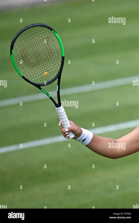 A female professional tennis player holding their racket in a ...