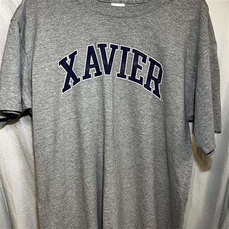 Vintage Xavier university tee on gildan ultra... - Depop