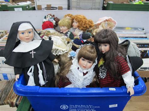 Lot 1173 - A large collection of porcelain dolls to