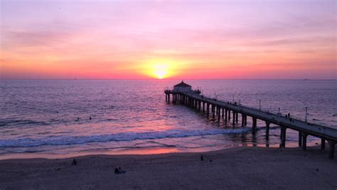 manhattan beach pier flyover during sunset Stock Footage Video (100% ...