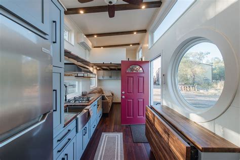 Kim’s 30′ x 8′ Tiny Home is Two-Loft Cozy Dwelling on Wheels