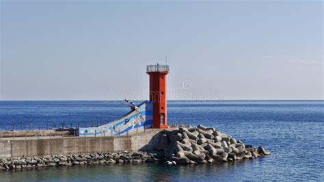 Red Lighthouse in Sokcho City Editorial Photo - Image of sokcho, beach ...