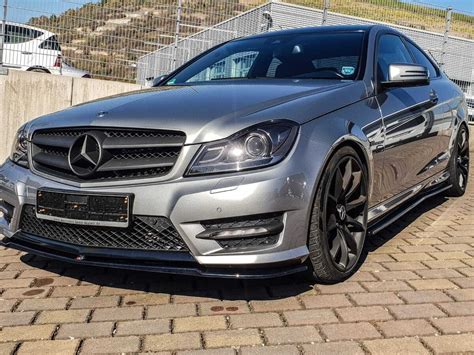 Mercedes W204 facelift 11 14 AMG line etupuskurin kiiltävän musta