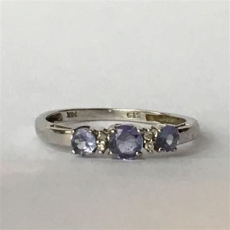 Vintage Tanzanite Ring With Diamond Accents Set In 14k White Gold