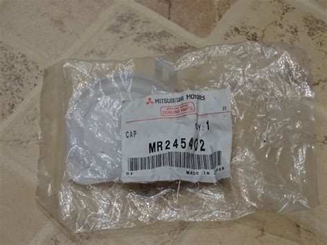 MR245402 Крышка бачка омывателя лобового стекла Mitsubishi | Запчасти ...