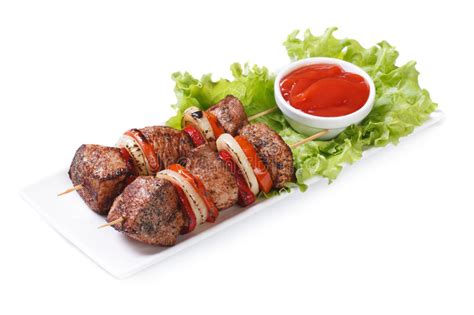 Kebab Del Cerdo Con Las Verduras Y La Salsa Aisladas Imagen De Archivo