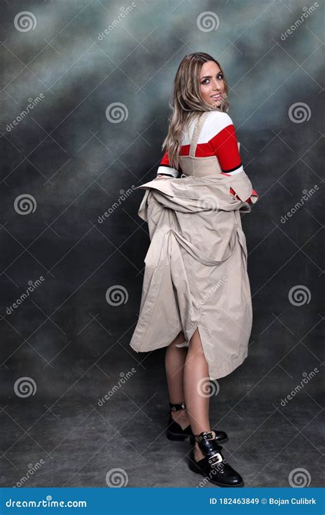 Beautiful Glamourous Blonde Girl Posing In Studio On Isolated Background Style Trends