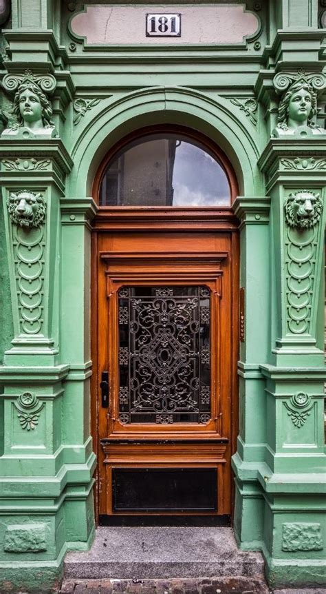 Heidelberg, Germany door --- love all of this - the color the lions ...