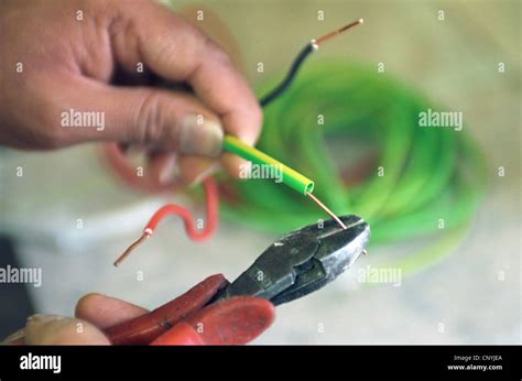 Striping electrical wire Stock Photo - Alamy