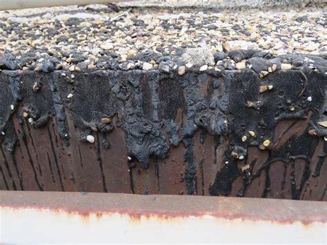 Pictures: Telltale Signs of a Coal Tar Pitch Roof | Roof Help