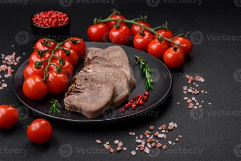 Delicious Boiled Beef Tongue Sliced With Vegetables And Spices 23443949