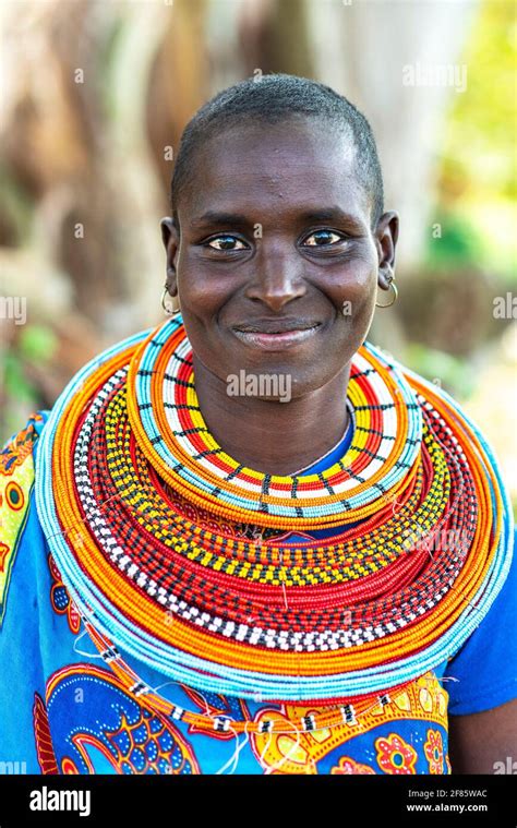 Traditional African Maasai Woman Wearing Beaded Necklace And Colorful