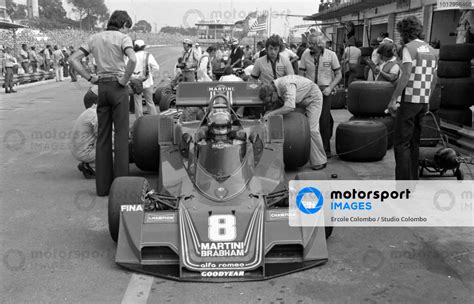 Mechanics Work On The Rear Of Carlos Pace S Brabham Bt Alfa Romeo In