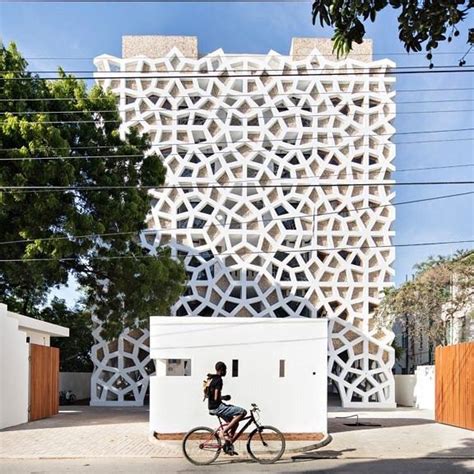 Reposting Sasquared White Latticed Screens Encase Apartment Block In