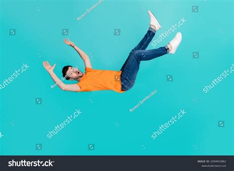 full size photo frightened guy falling stock photo