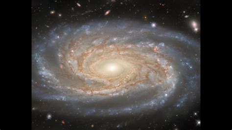 Hubble Telescope's views of enormous spiral galaxy illuminate a big ...