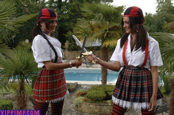 Two Hot Girls Showing Their Nice Figures In Uniforms Photos
