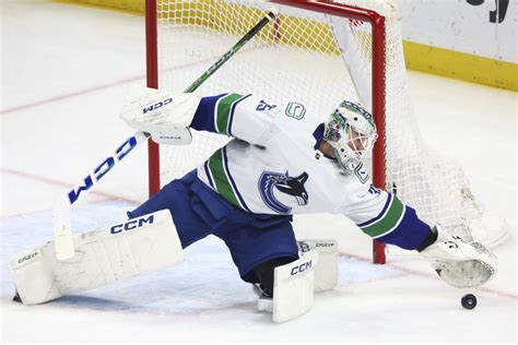 Sam Lafferty scores and Thatcher Demko makes 26 saves as the Canucks ...