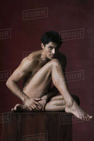 Nude Man Sitting With Head Resting On Knee Full Length Portrait Royalty Free Stock Photo