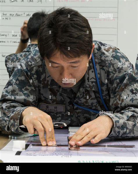 Japan Air Self Defense Force Members Identify Important Information By