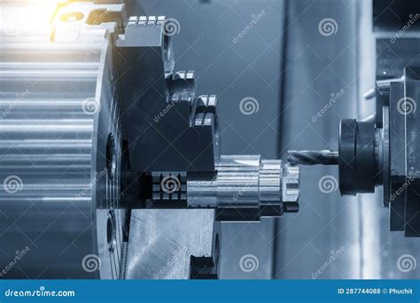 The Cnc Lathe Machine Milling Cut The Metal Shaft Parts By Milling