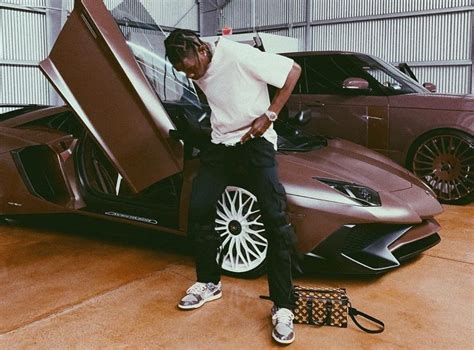 Spotted Travis Scott Shows Off His Lamborghini Aventador And Lv