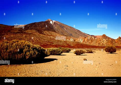 Volcano Teide With Los Roques De Garcia In The Foreground Island